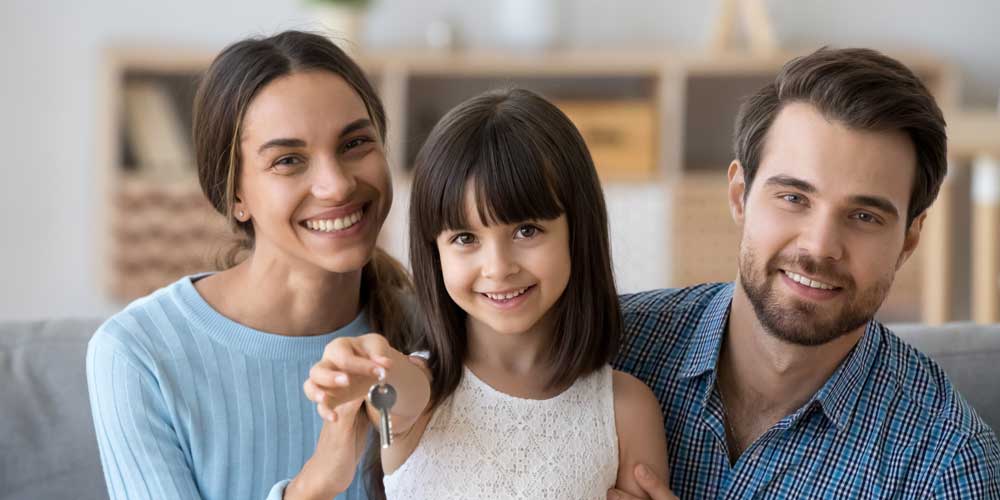 young mom and dad with daughter